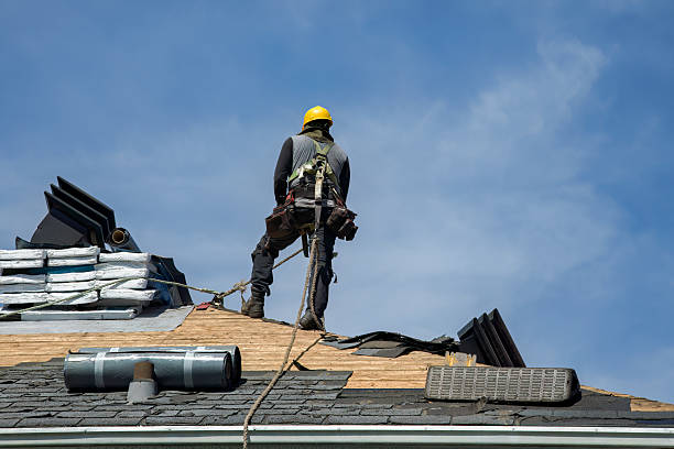Professional Roofing technician working in Heath, MA